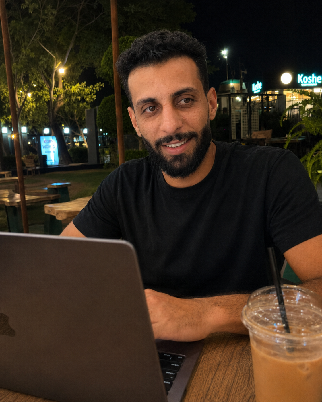 Kareem Ayman working on AI projects